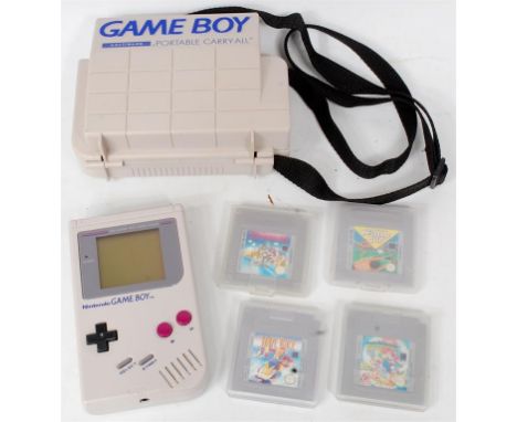 Nintendo Gameboy Group, to include original Nintendo Game Boy Hand Held Console, 4 various games, all in a Gameboy Portable C
