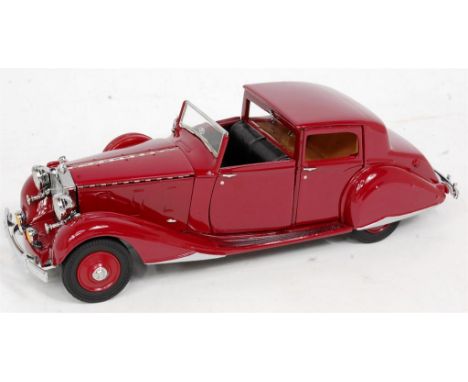 Danbury Mint 1/24th scale model of a 1938 Rolls Royce Phantom III, finished in garnet, with certificate and paperwork, in the