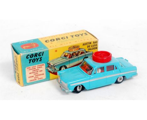 Corgi Toys, 236, Corgi Motor School Car, light blue body with silver flash, spun hubs, 2 figures, with the original all card 