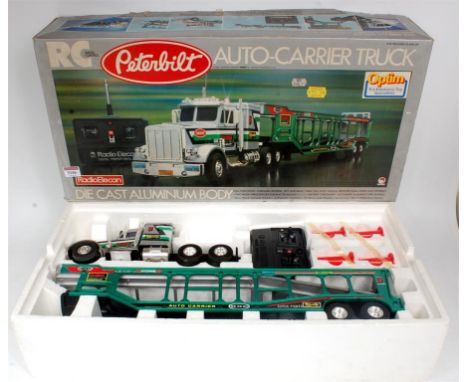 Radio Elecon 1/24th scale radio control model of a Peterbilt Auto Carrier Truck, little use, in the original polystyrene and 