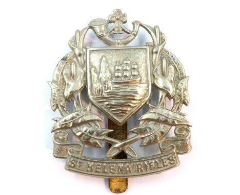 St Helena Rifles WWI / WWII silvered cap badge. P&amp;P Group 1 (£14+VAT for the first lot and £1+VAT for subsequent lots) 