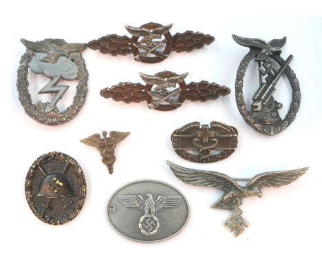 A collection of German WWII replica awards, including Luftwaffe close combat (8). P&amp;P Group 1 (£14+VAT for the first lot 