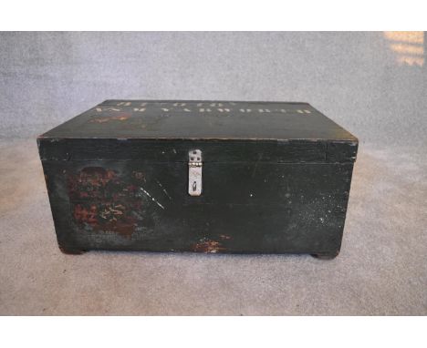 A vintage green painted pine trunk. H.28 x 64cm 