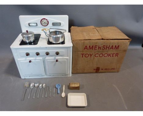 A vintage AMERSHAM TOYS 'Made in England' early 20th century tinplate toy cooker / stove / oven with kettle complete with sau