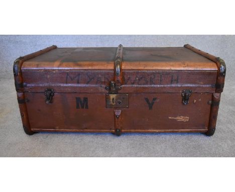 A vintage canvas and beechwood bound steamer trunk. H.37 x 80cm 