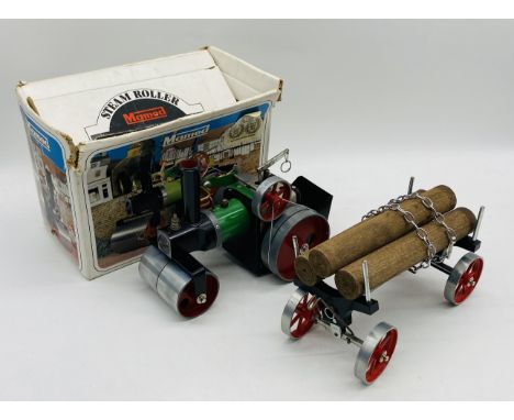 A vintage boxed Mamod S.R.1a Steam Roller, along with an unboxed log trailer