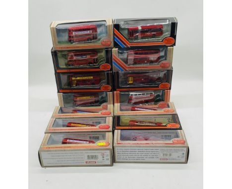 A collection of fourteen boxed Gilbow Exclusive First Editions die-cast buses and coaches all relating to London Transport in