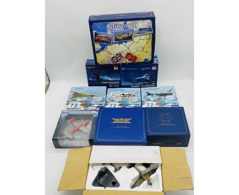 A collection of boxed aviation die-cast display model planes including two by Hobby Master, three by 72 Aviation, three by Ox