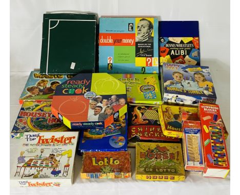 A collection of vintage and modern board games including Twister, Magic Robot, Towering Blocks, Double Your Money, Chinese Ch