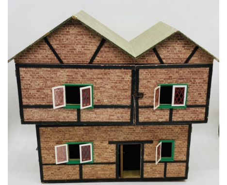 A vintage wooden doll house