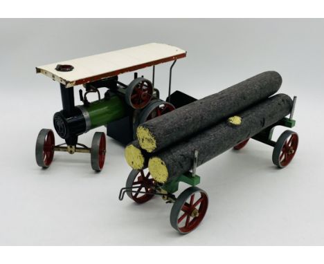 A vintage unboxed Mamod steam engine tractor with log trailer 
