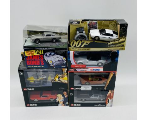 A collection of seven James Bond die-cast cars including four from the Corgi "The Definitive Bond Collection", Hornby Hobbies