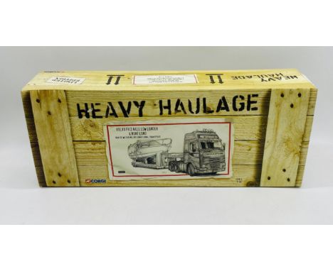 A boxed Corgi Heavy Haulage limited edition die-cast (1:50 scale) Volvo FH 2 Axle Low Loader & Boat Load Van De Wetering Inte