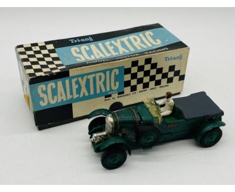 A boxed Scalextric Tri-ang Bentley vintage racing car (C64) - Drivers arm off but present.
