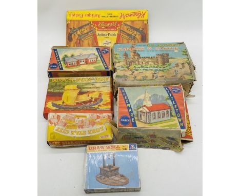 A collection of vintage boxed plastic construction kits including two Kleeware Littleware buildings, Lone Star City Western P