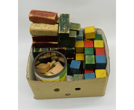 A collection of vintage wooden toy building blocks