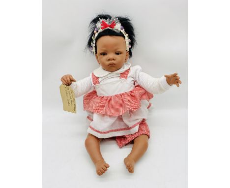 An unboxed Waltraud Hanl for Ashton Drake Galleries So Truly Real "Jasmin's First Birthday" doll
