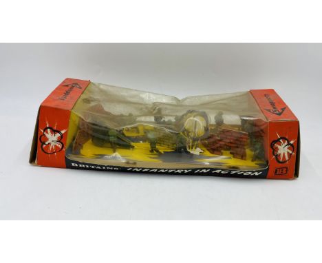 A vintage boxed Britains Ltd  Swoppits Infantry In Action plastic model set (7336)