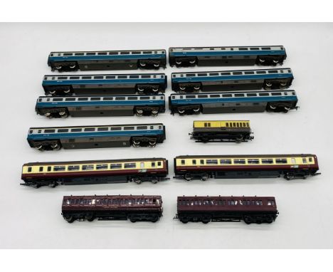 A collection of unboxed OO gauge model railway passenger coaches including seve n Jouef Intercity coaches, two Hornby GPT Rai