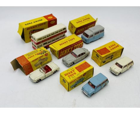 A collection of six vintage Dinky Toys die-cast vehicles including Ford Anglia (155), Volkswagen Karmann Ghia Coupe (187), MG