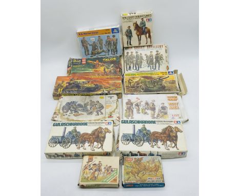 A collection of various boxed military plastic model kits including two Tamiya German Field Kitchens, Tamiya Wehrmacht Mounte