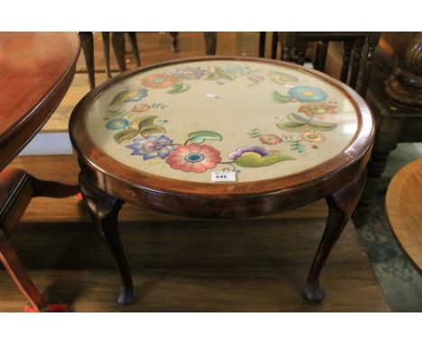 20th Century stained circular coffee table with inset floral tapestry top.