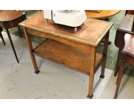 Art and crafts style oak two tier table with copper tiled top.