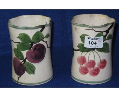 Two Llanelly pottery shufflebotham decorated waisted cylinder vases, painted with cherries and plumbs.  One marked "Llanelly 