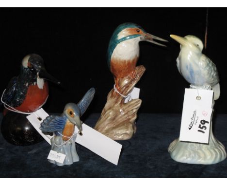 Group of china King fisher ornaments to include Wade and two others together with a glass king fisher paper weight.  (4)