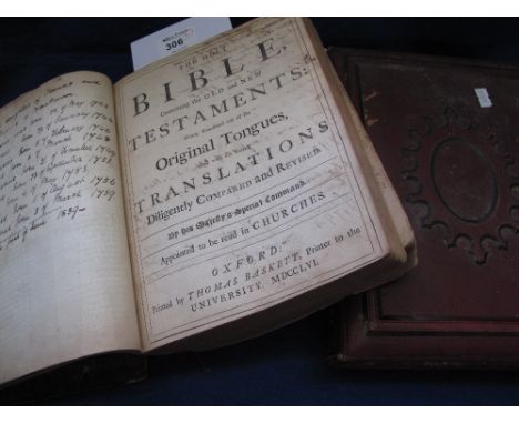 Leather bound Bible printed by Thomas Baskett and dated 1756, together with a large leather bound album of Victorian portrait