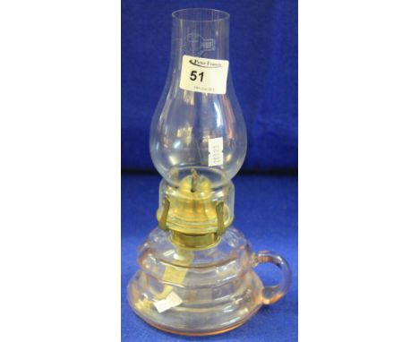 Early 20th Century glass chamber oil lamp with loop handle and glass chimney.