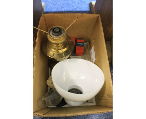 Aladdin single burner oil lamp with cream shade, two funnels and accessories.