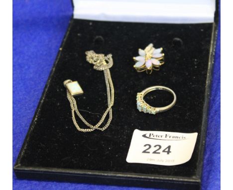 9ct gold opal pendant and chain, Victorian design opal dress ring and a simulated opal flower head pendant.  (3) CONDITION RE