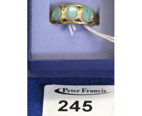 Silver three stone triplet opal ring.