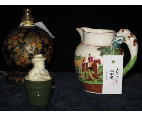 Wedgwood Dye Ken John Peel pottery hunting jug, a Kashmiri composition table lamp base and a china man in a barrel ornament. 