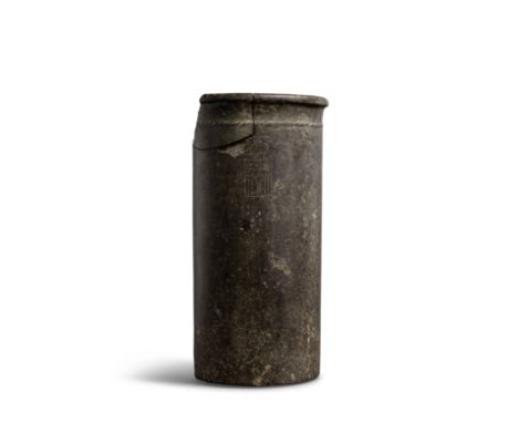 An Egyptian diorite cylindrical vase inscribed for the Pharaoh Narmer Early Dynastic, 1st Dynasty, circa 3150 B.C.one side w