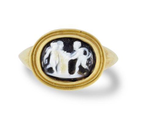  A Roman onyx cameo with three figures at an altar Circa 2nd Century A.D. Set in a modern gold ring, intaglio 1.4cm diam.; ri