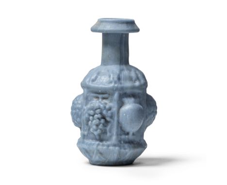  A Sidonian opaque pale blue hexagonal glass bottle Eastern Mediterranean, circa mid-late 1st Century A.D.7.4cm highFootnotes