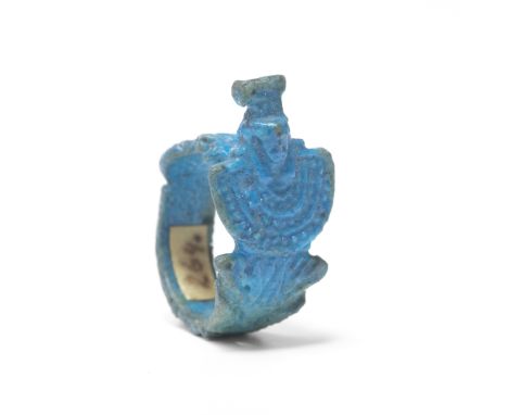  An Egyptian turquoise glazed faience ring with aegis of Nephthys Third Intermediate Period, 22nd Dynasty, circa 946-735 B.C.