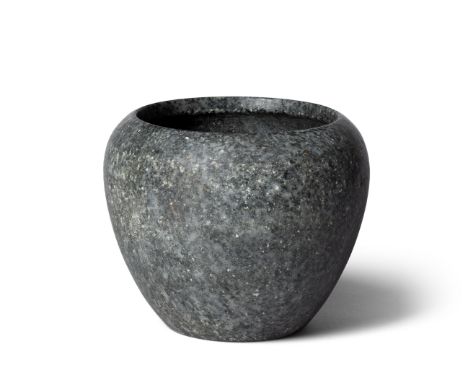  An Egyptian dark diorite gneiss globular jar Early Dynastic, 1st-3rd Dynasty, circa 3100-2600 B.C.13cm high, 15.6cm wideFoot