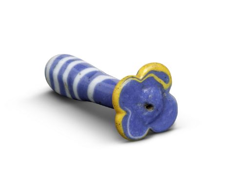  An Egyptian blue and white glass ear plug  New Kingdom, 18th-19th Dynasty, circa 1350-1250 B.C.3cm highFootnotes:Provenance: