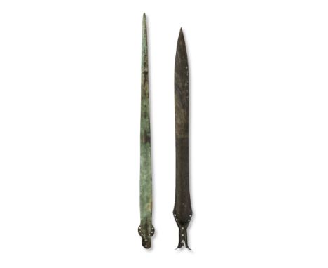  Two European bronze swords Late Bronze Age, circa 13th-10th Century B.C.61.5cm and 58cm long  (2)Footnotes:Provenance:Kuizen