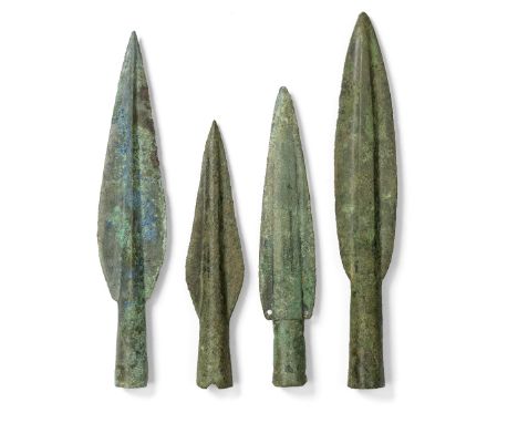  A European incised decorated socketed spearhead and three other spearheads Late Bronze Age, circa 13th-9th Century B.C.18.4c