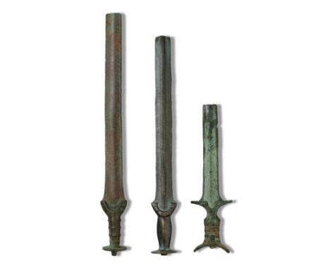  Three Central European bronze 'ritually broken' swords Late Bronze Age, circa 13th-10th Century B.C.47.3cm, 42.5cm and 29cm 