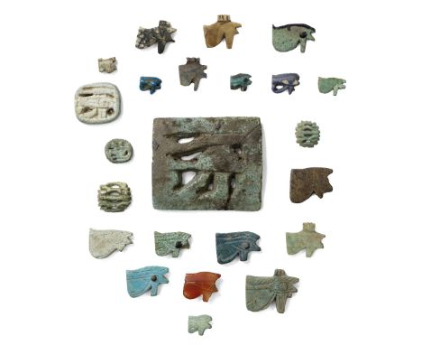  A group of Egyptian udjat eye amulets Late Period, circa 664-332 B.C.Including five plaques; six hard stone amulets; a dark 