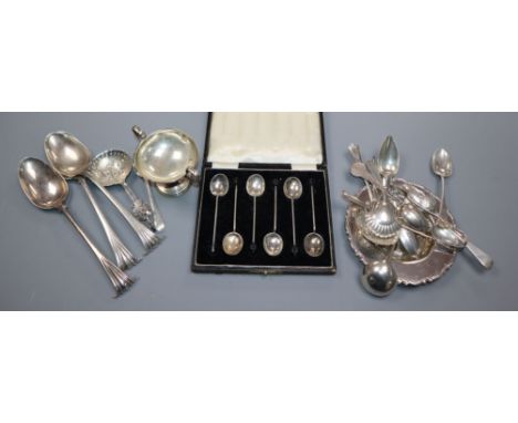 A set of four modern silver dishes, a small group of assorted silver flatware including a caddy spoon and a plated small cup.