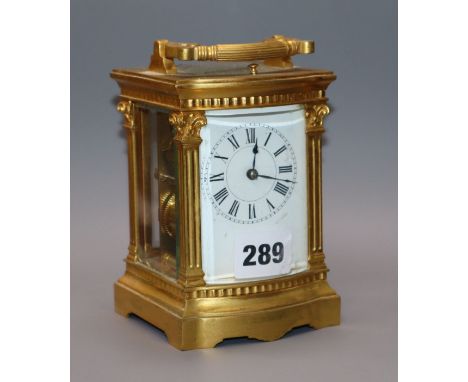 A late 19th century French gilt brass eight day repeating carriage clock, with bow front case height 14cm