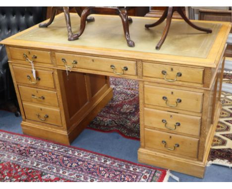 A Victorian light oak pedestal desk W.136cm