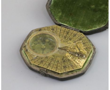 A French brass Butterfield pattern sundial, with elongated octagonal plate divided into three hour scales, signed Butterfield