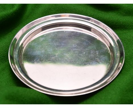 A small silver coaster/tray raised on 3 flattened ball feet. Hallmarked London 1883, 'FH'. 112g. VGC. £30-50 
